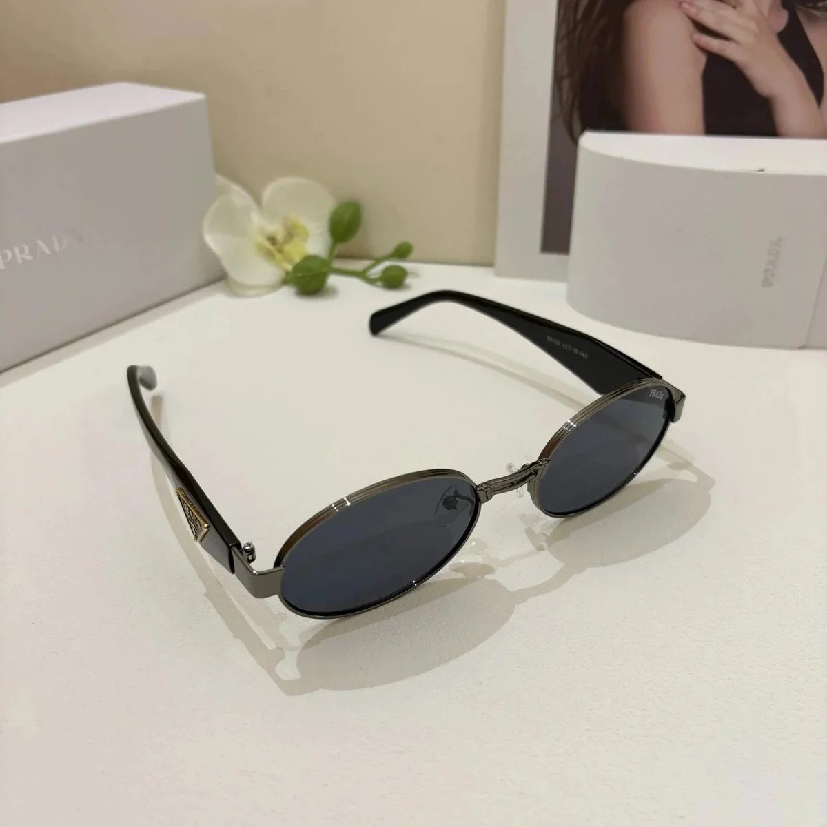Prada Prada Sunglasses Gunmetal/Black Oval Frame Black