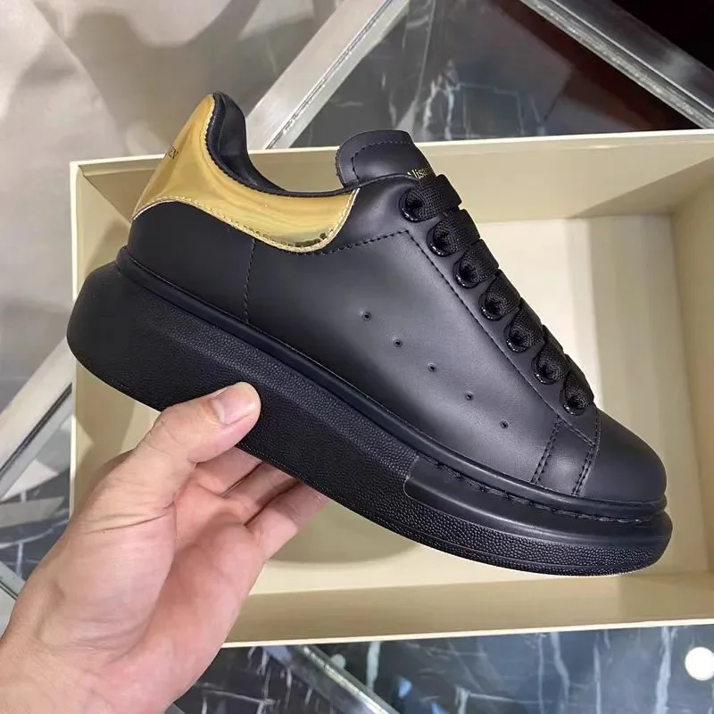 Alexander McQueen Alexander McQueen Oversized Black & Gold Sneakers Black - 1
