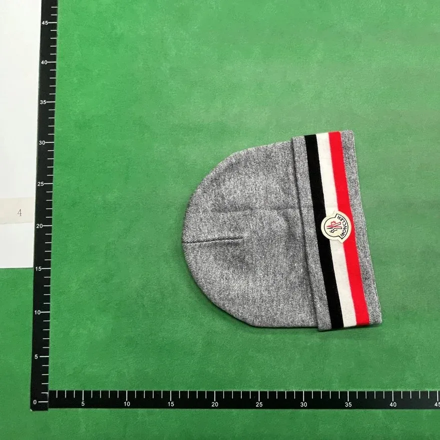 Moncler Grey Beanie with Red, White, and Black Stripes