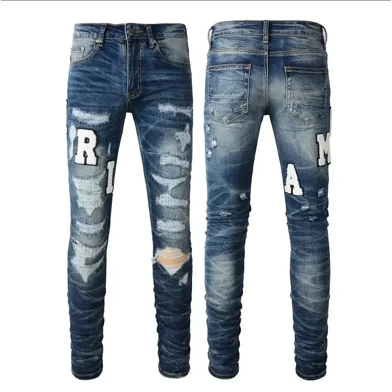Amiri Distressed Jeans with Letter Patches Blue - 1