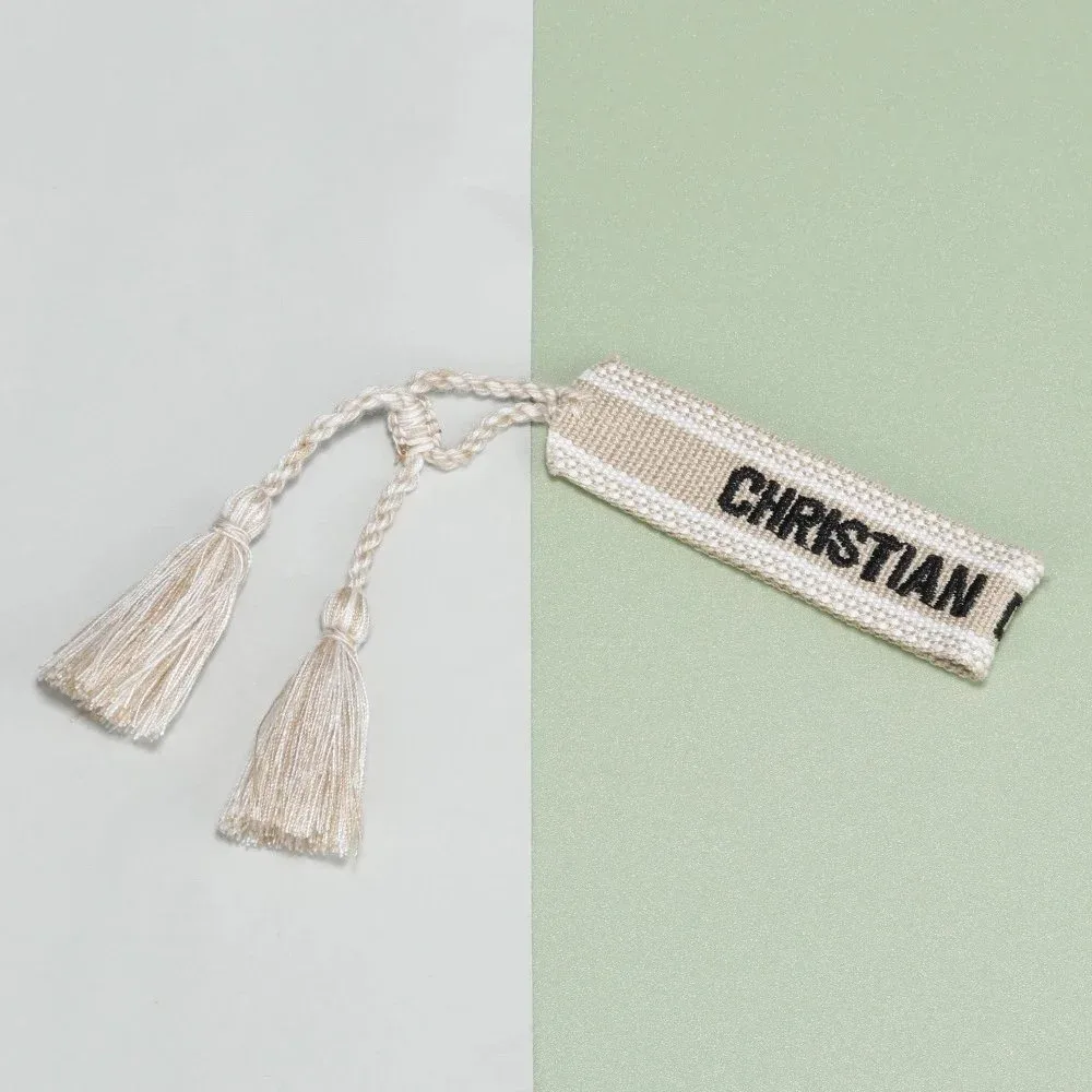 Christian Louboutin Christian Louboutin Tassel Bookmark Cream - 1
