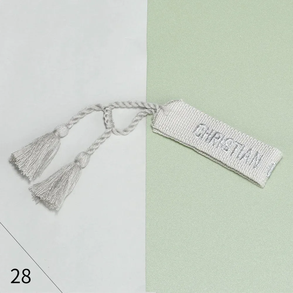 Christian Louboutin Christian Louboutin Tassel Tag White - 1