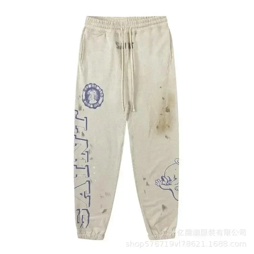 Saint Laurent Unisex Beige Distressed Sweatpants with Graphic Print Beige - 1