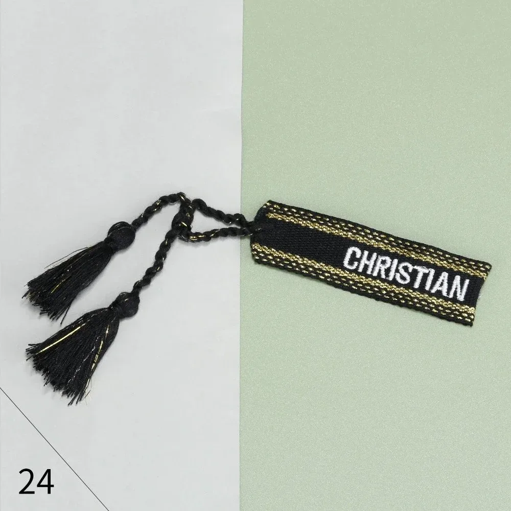 Christian Louboutin Personalized 'CHRISTIAN' Tassel Bookmark Black - 1