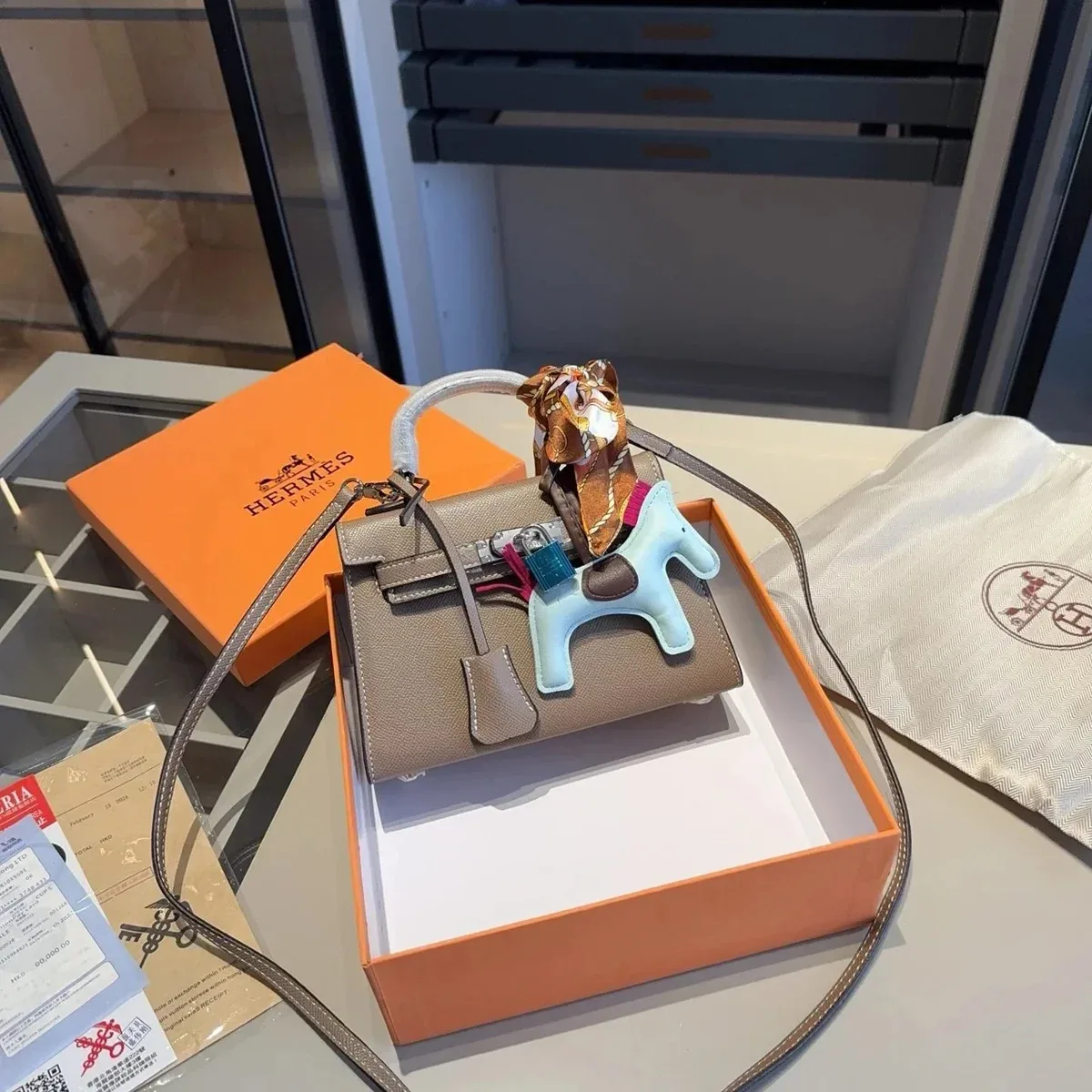 Hermès Hermès Kelly Mini Beige Leather Handbag with Horse Charm Beige