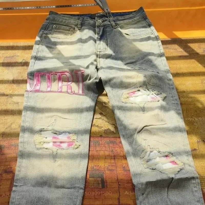 Amiri Amiri Distressed Jeans with Pink 'MIRI' Graphic Blue - 1