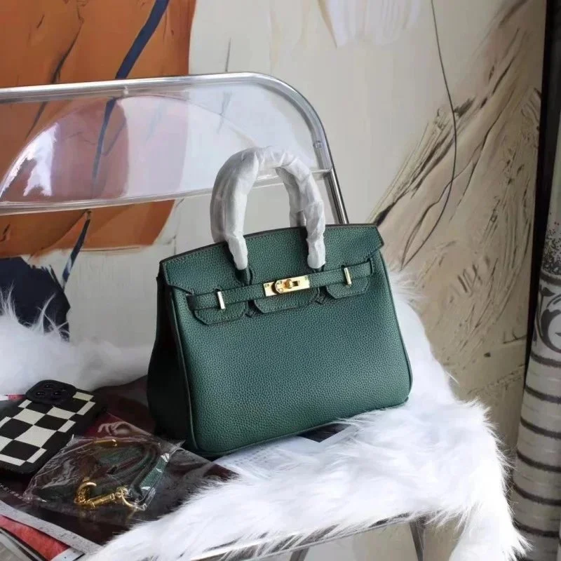 Hermès Birkin Dunkelgrüne Lederhandtasche