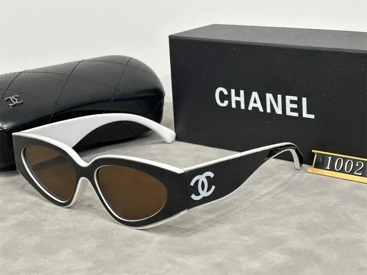 Óculos de sol gatinho Chanel Classic CC preto/branco