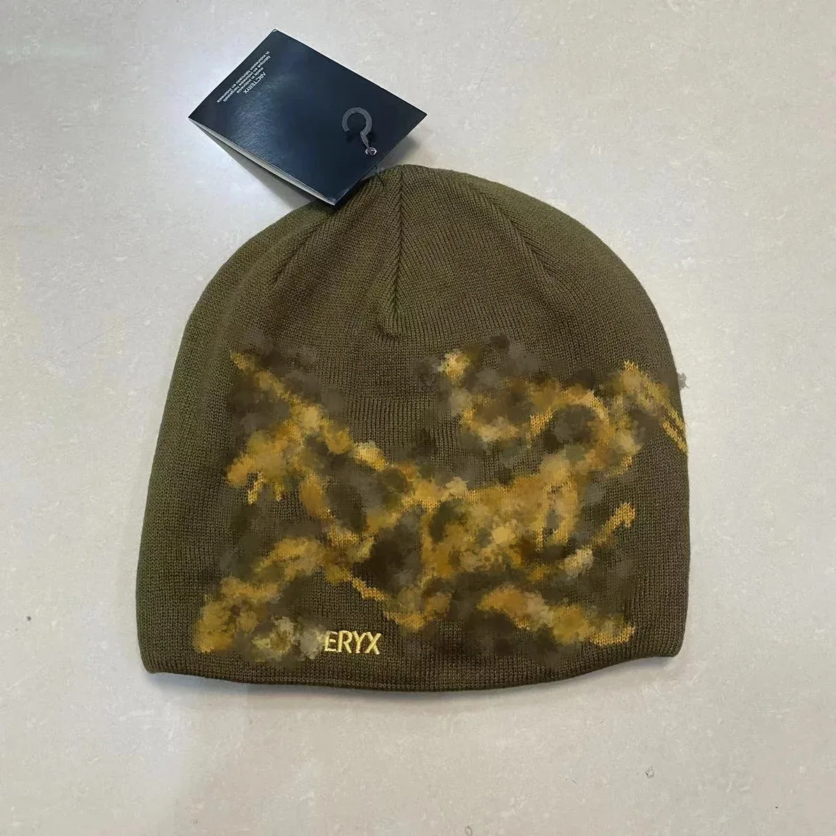 Other Olive Green Beanie with Abstract Print Headwear Green - 1