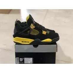 Nike Air Jordan 4 Black/Yellow Sneakers