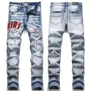 Distressed Denim Jeans with Graphic Patch