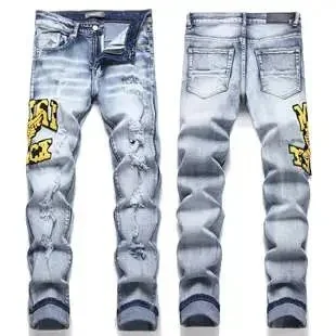 Distressed Denim Jeans with Yellow Patch
