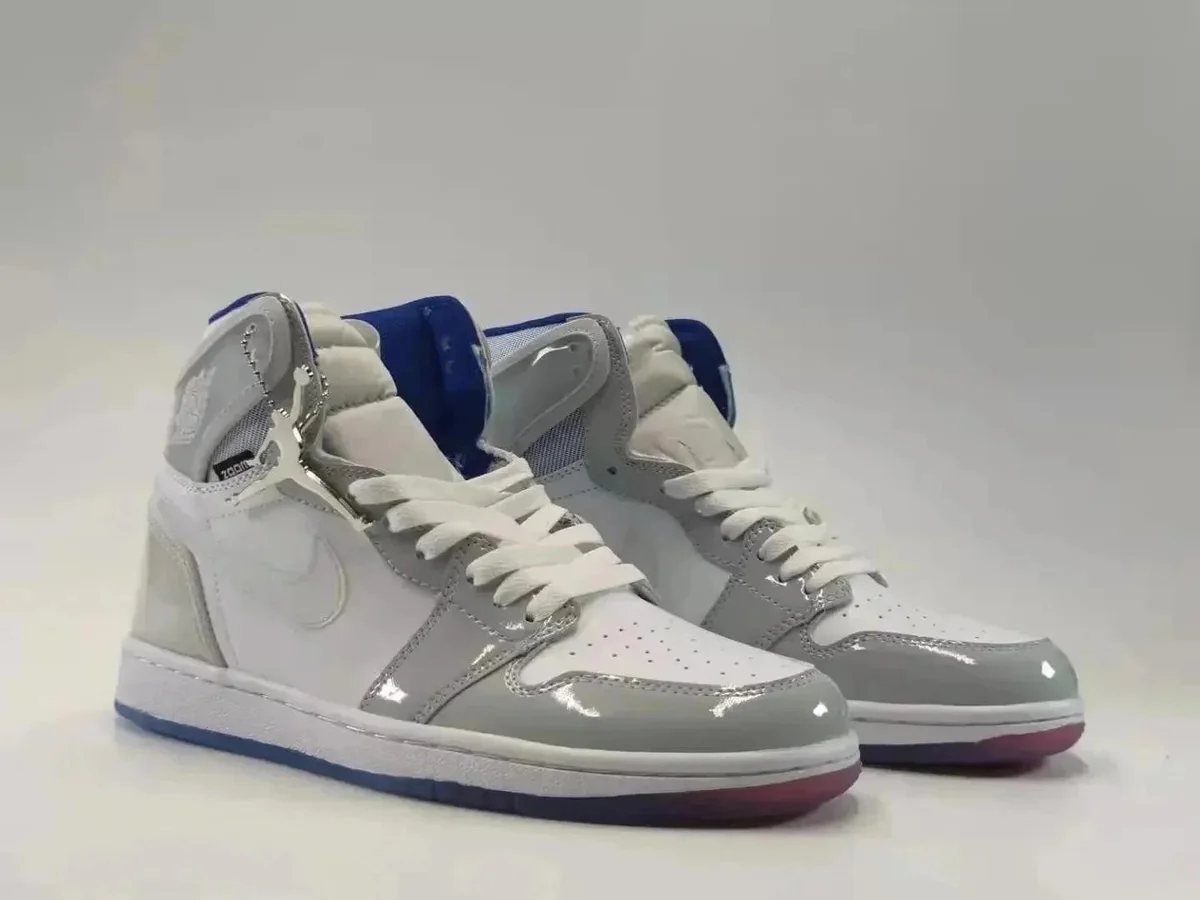 Nike Air Jordan 1 Retro High '22 Sail/University Blue Sneakers