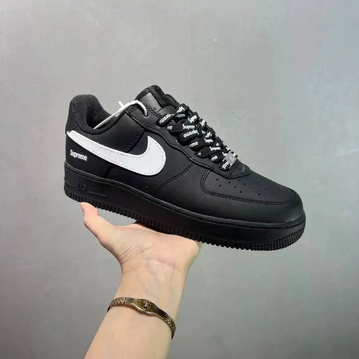 Nike Air Force 1 Supreme Triple Black Sneakers
