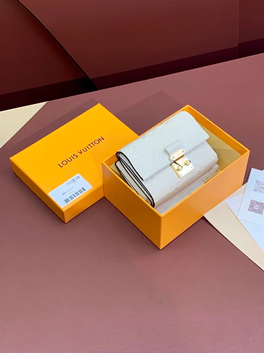 Louis Vuitton Tabi White Monogram Wallet