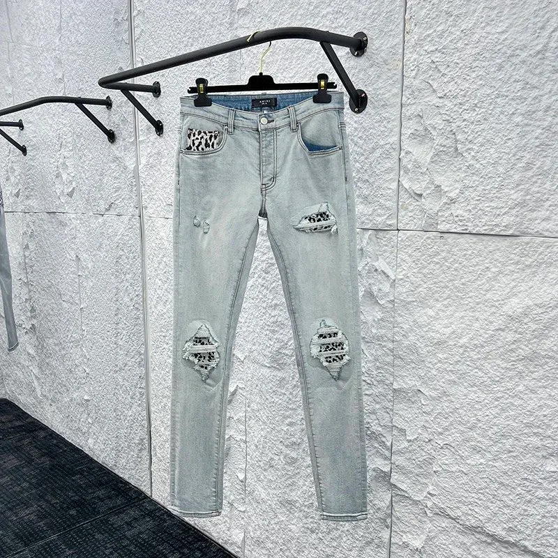 Light Wash Distressed Jeans with Leopard Patchwork