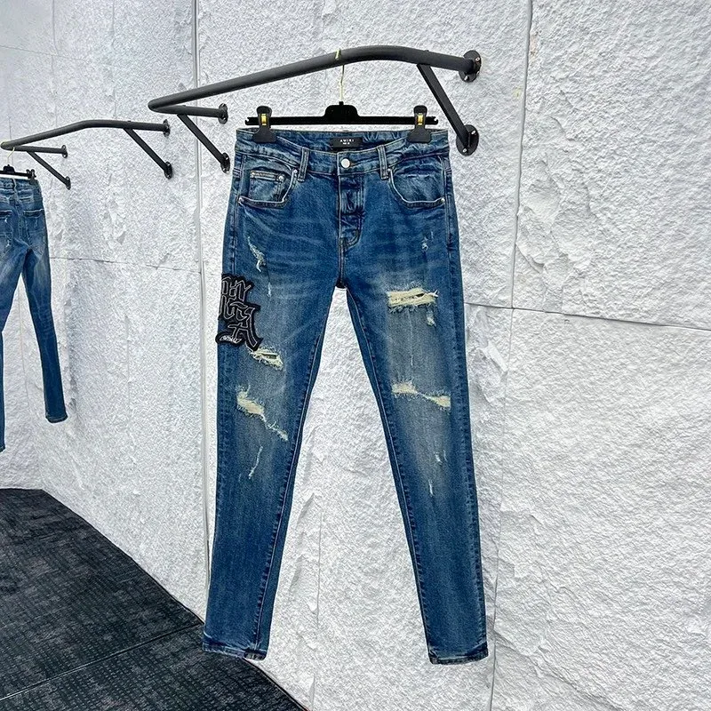Distressed Denim Jeans with Patch Detail