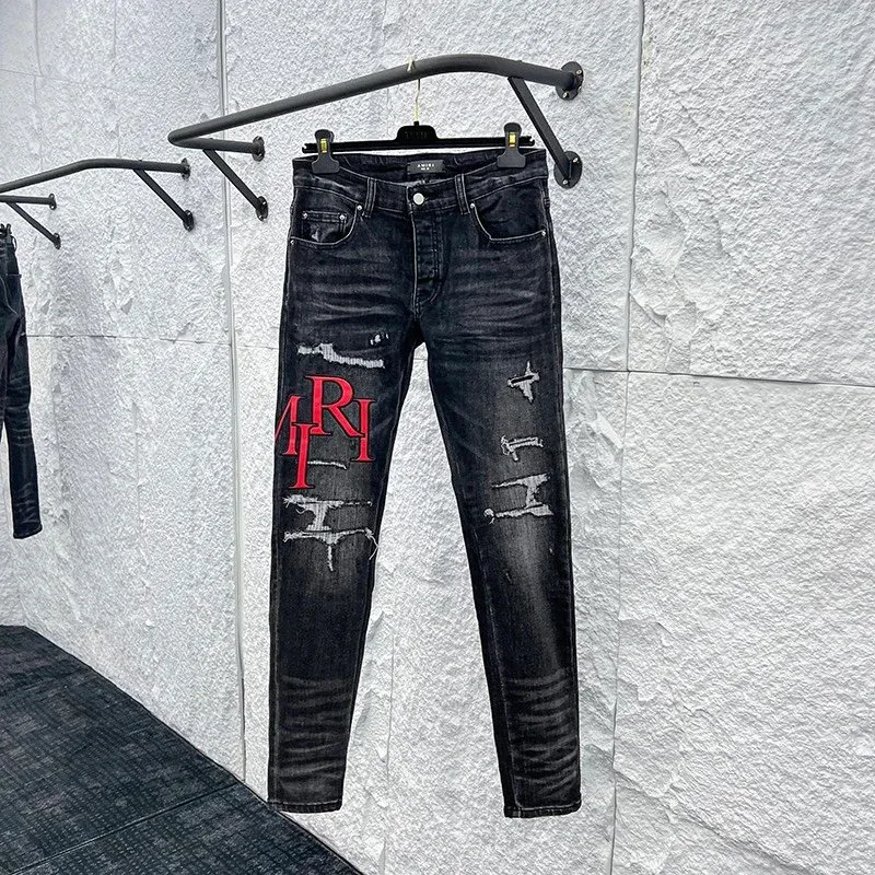 Amiri Distressed Black Jeans with Red Logo