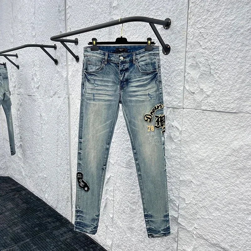Light Wash Distressed Jeans with Embroidery Patch