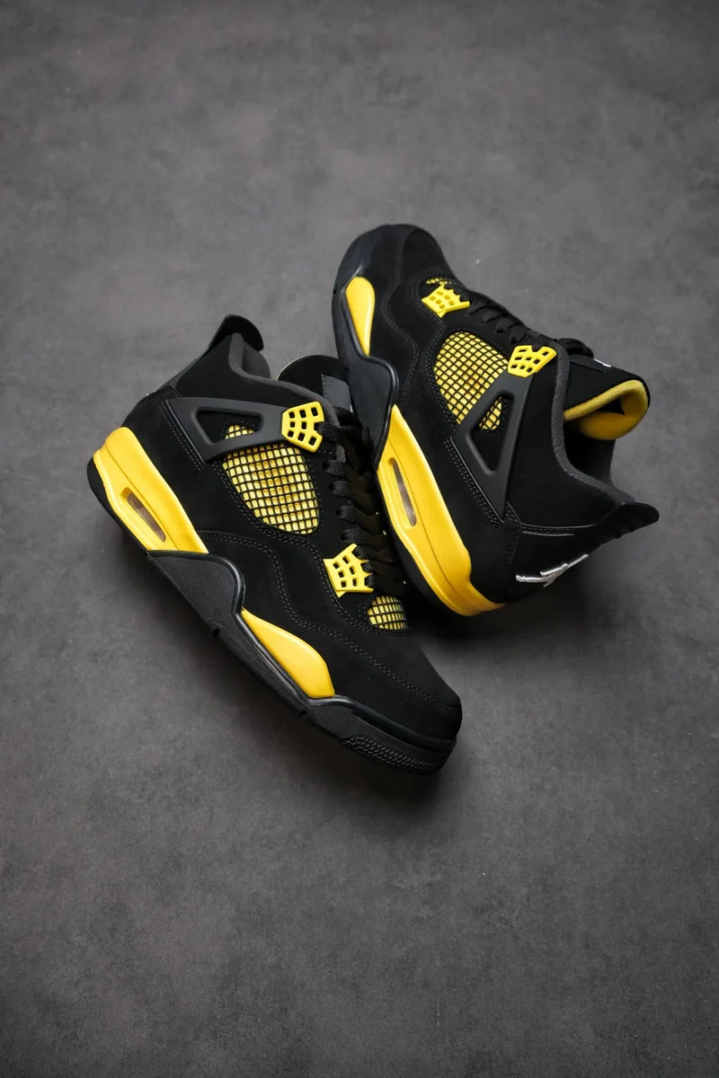 Nike Air Jordan 4 Black/Yellow Sneakers