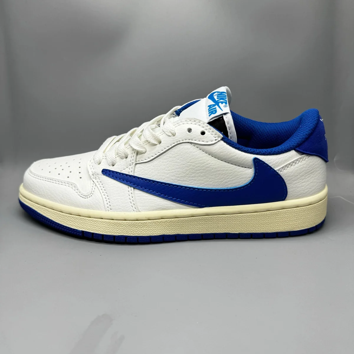Nike Air Jordan 1 Low Sail/University Blue Sneakers