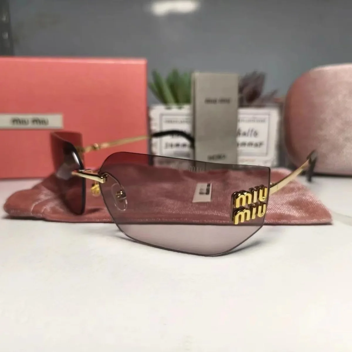 Miu Miu Gradient Lens Sunglasses Gold Frame