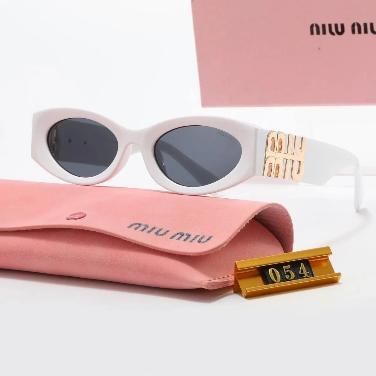 Miu Miu White Gold Frame Sunglasses