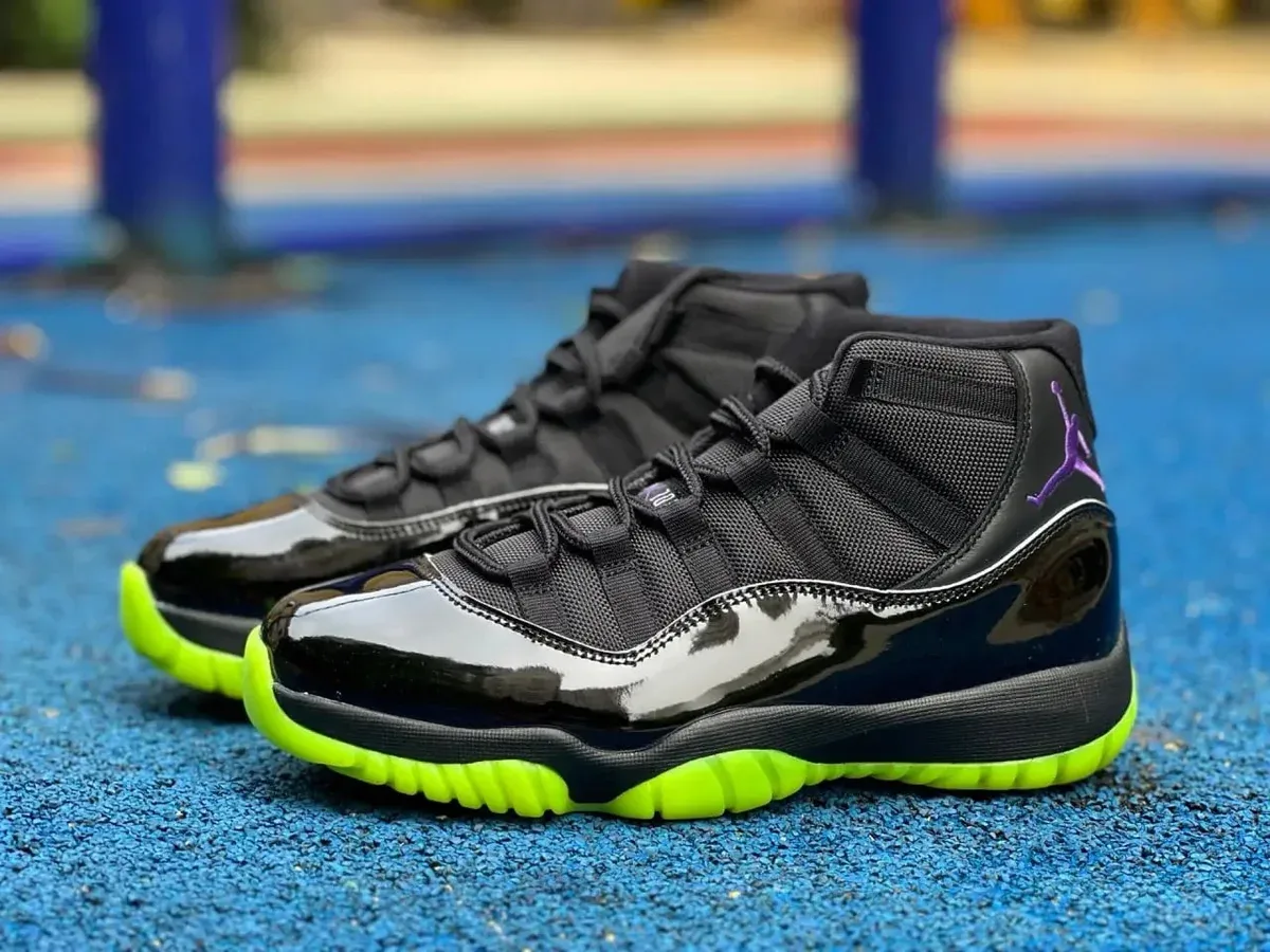 Nike Air Jordan 11 Black/Volt Sneakers