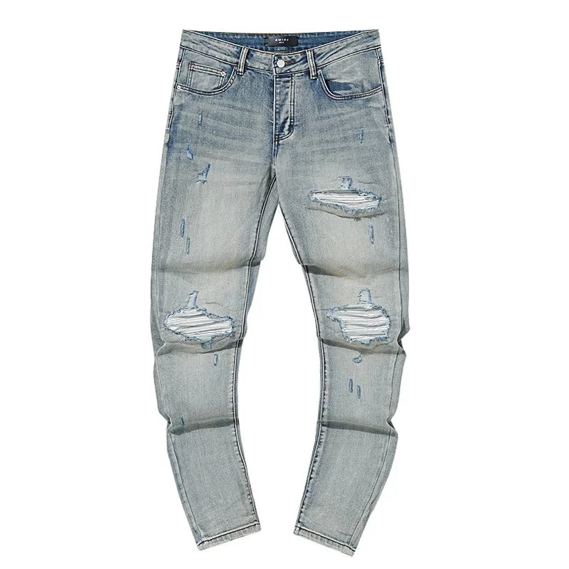 Amiri AMRI Light Wash Distressed Jeans