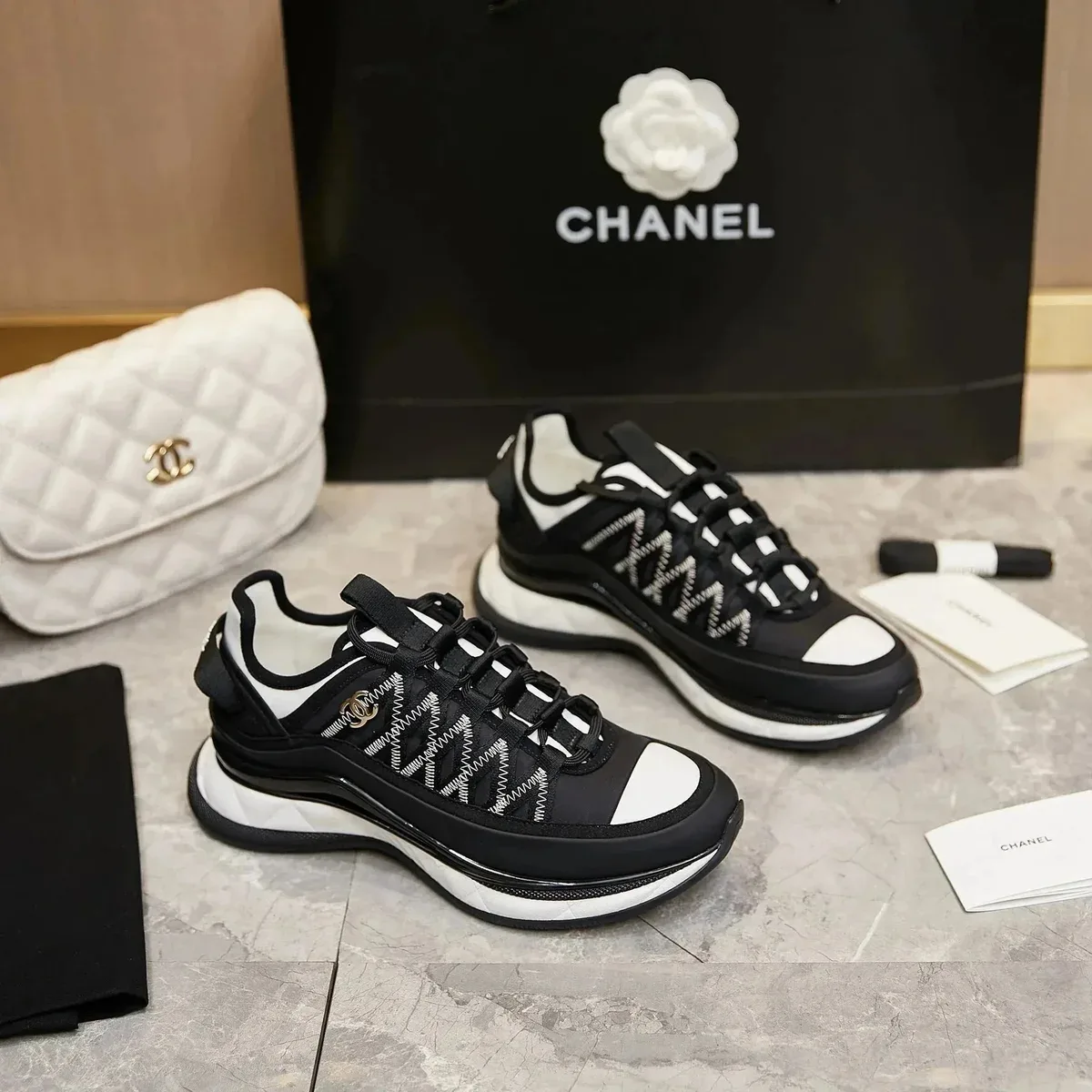 Chanel Runners Black/White Sneakers