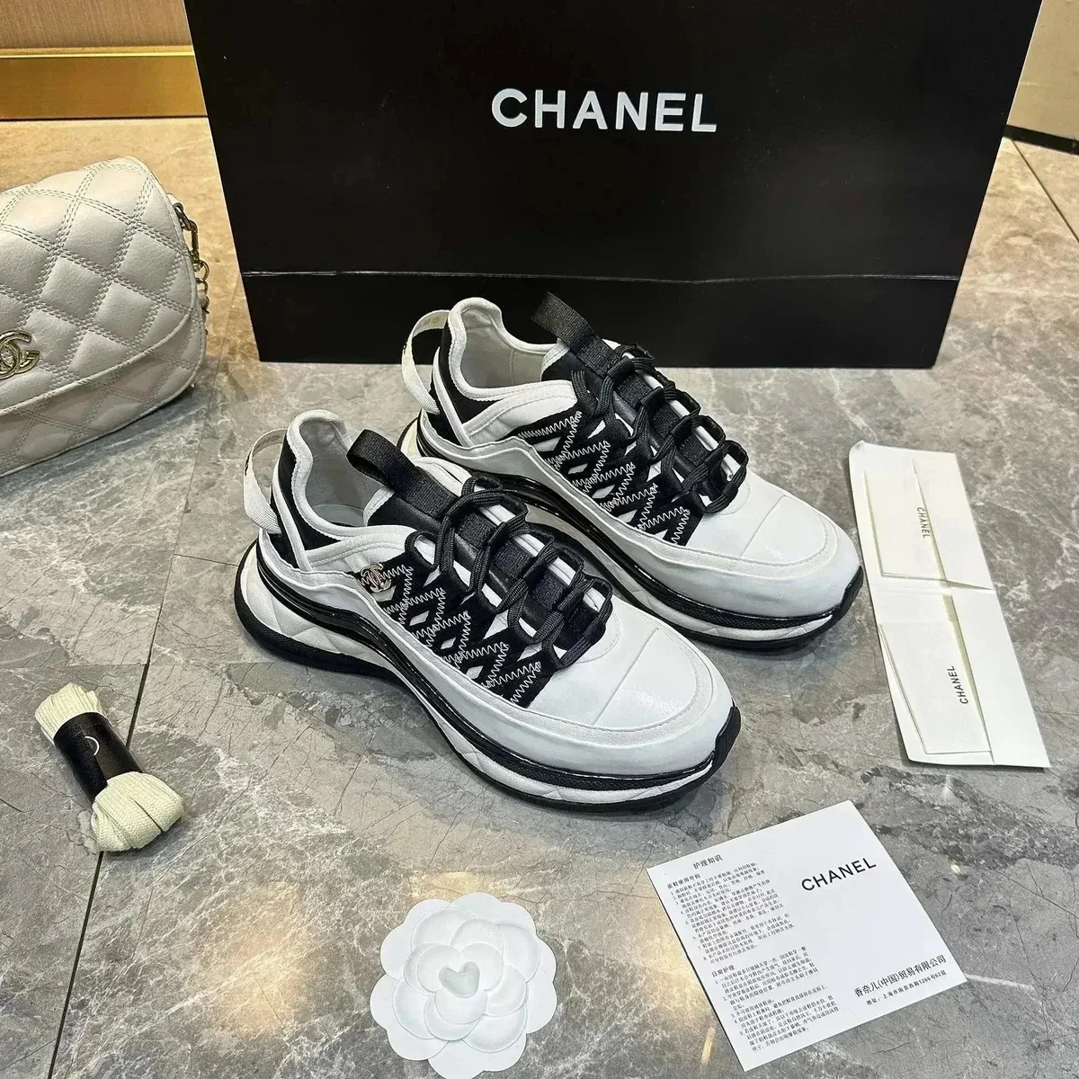 Chanel Runners White/Black Sneakers