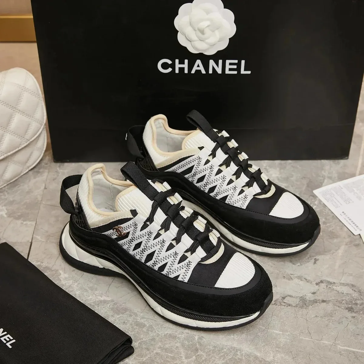 Chanel Runners Black & White Sneakers
