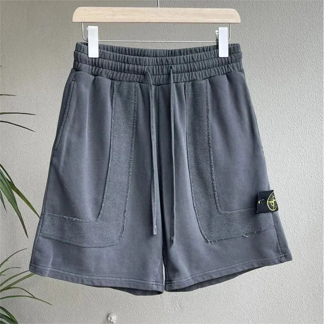 Stone Island 68-15 Grey Solid Shorts