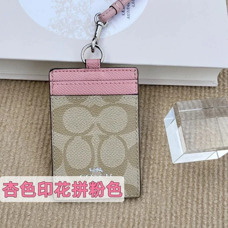 Coach杏色印花拼粉色卡包