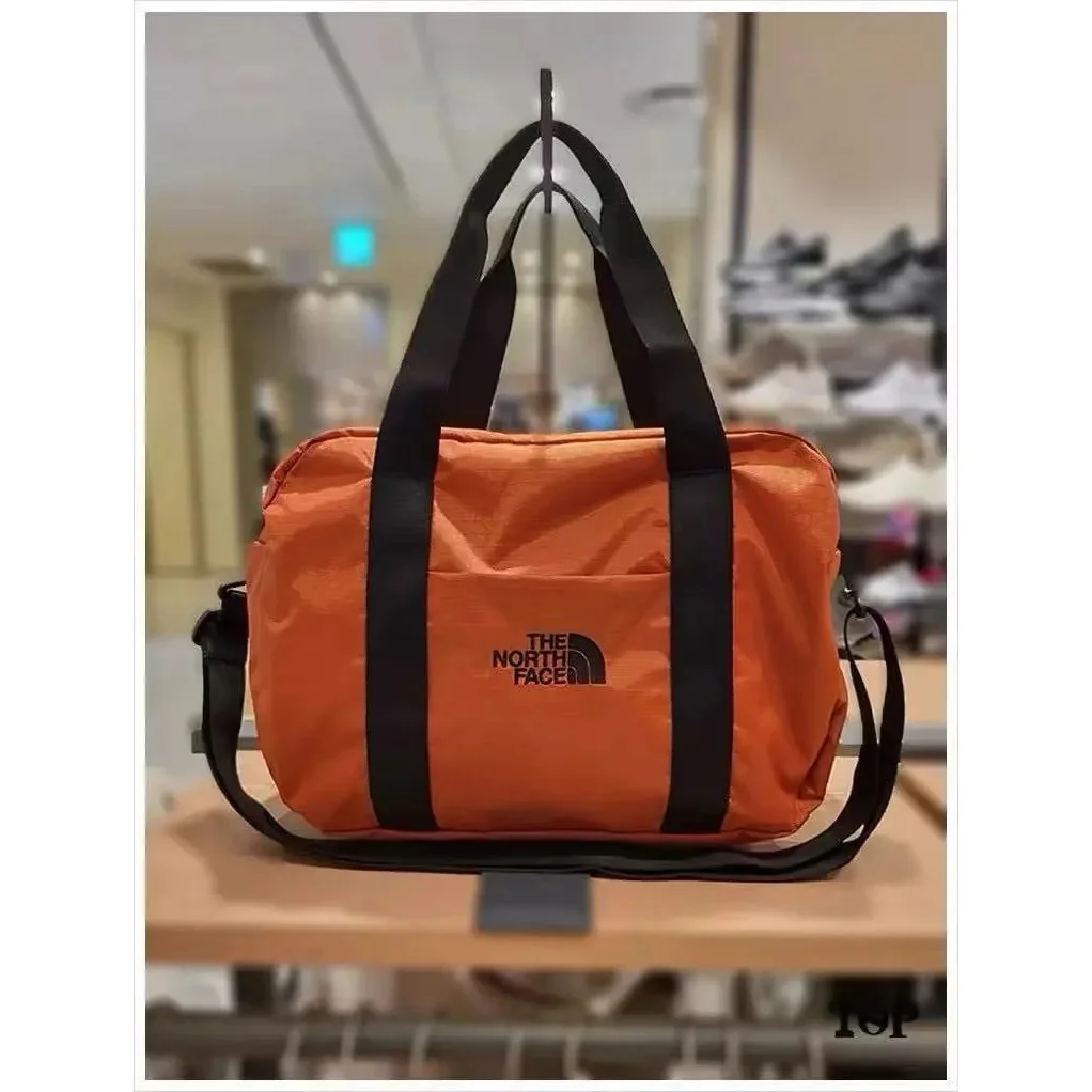 The North Face Orange Travel Duffle Bag