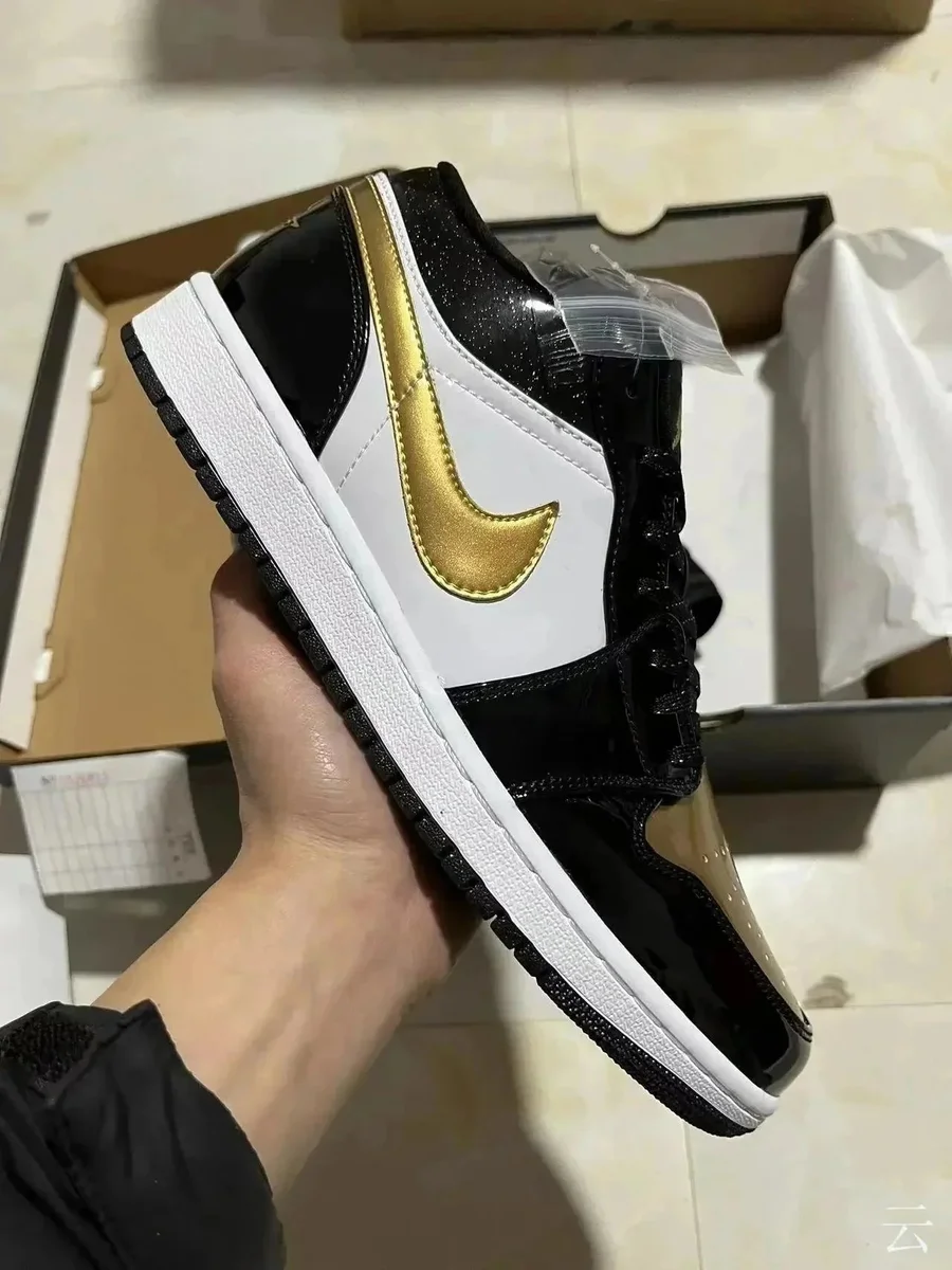 Nike Air Jordan 1 Low Black Gold Sneakers