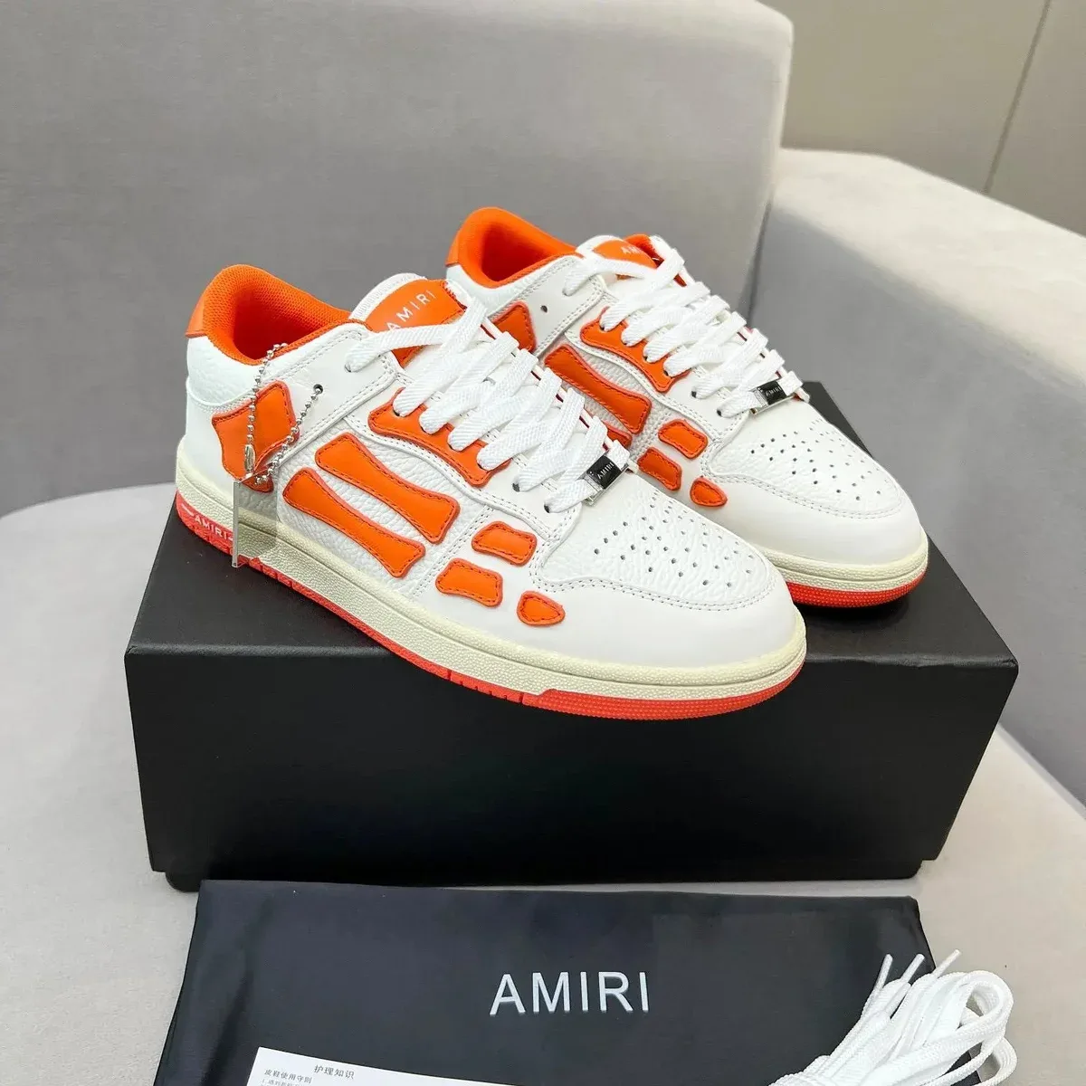 Amiri AMRI White & Orange Low Top Sneakers