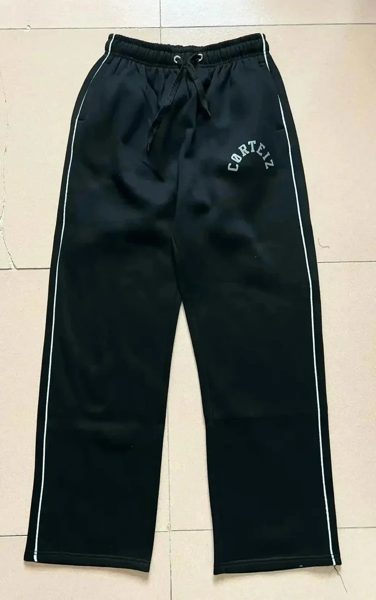 Corteiz Black Track Pants with White Side Stripes