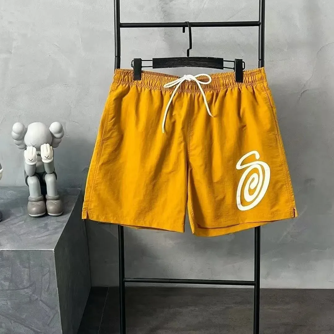 Unisex Yellow Spiral Print Shorts