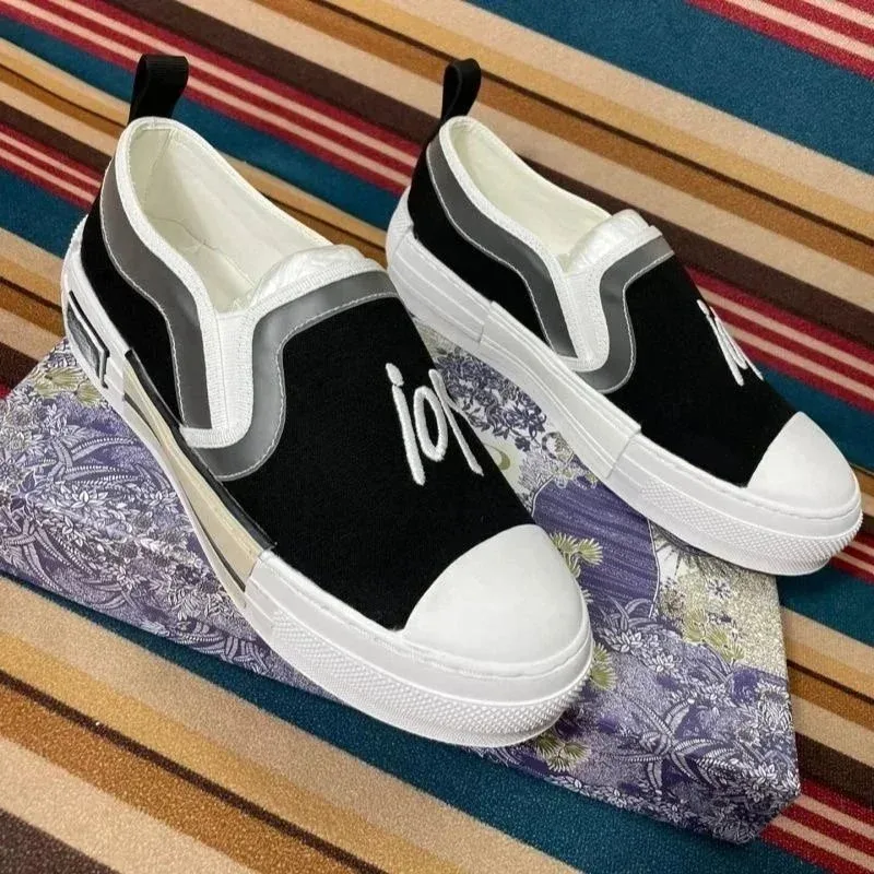 Unisex Black & White Embroidered Slip-On Sneakers
