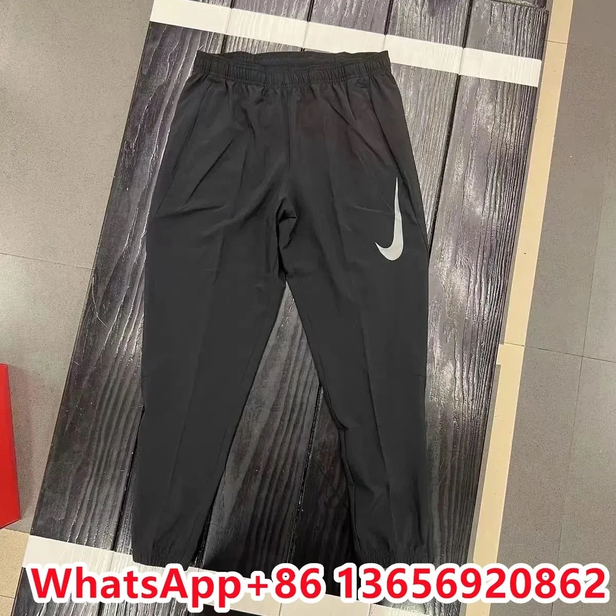 Nike Black Swoosh Track Pants