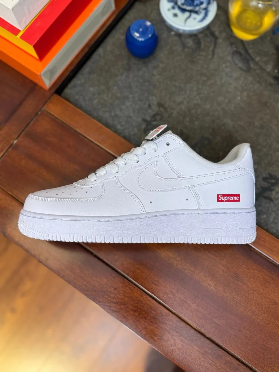 Nike Air Force 1 Supreme White Sneakers