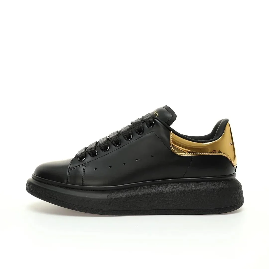 Alexander McQueen Oversized Black & Gold Sneakers