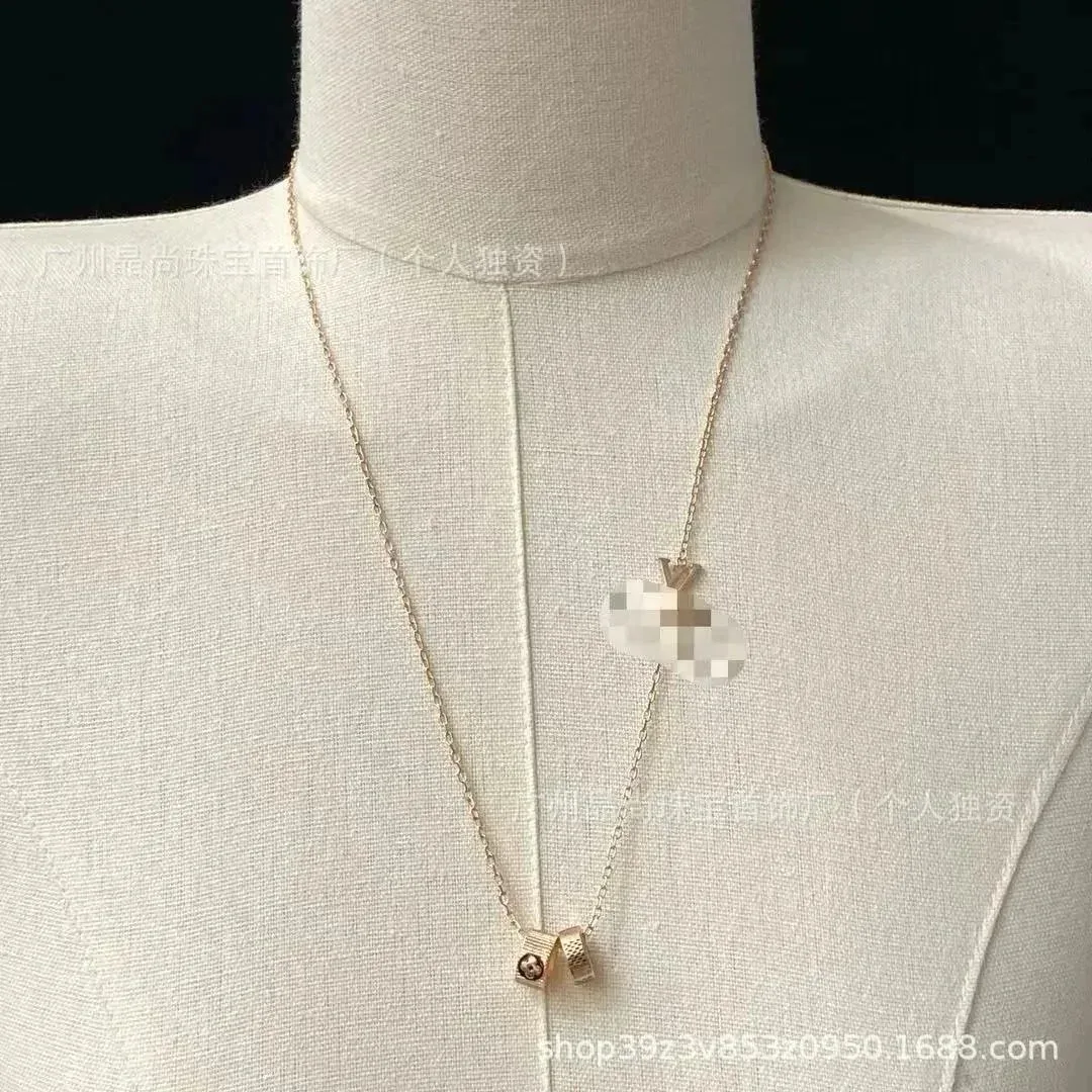 Gold-Tone Pendant Necklace with Crystal Accents