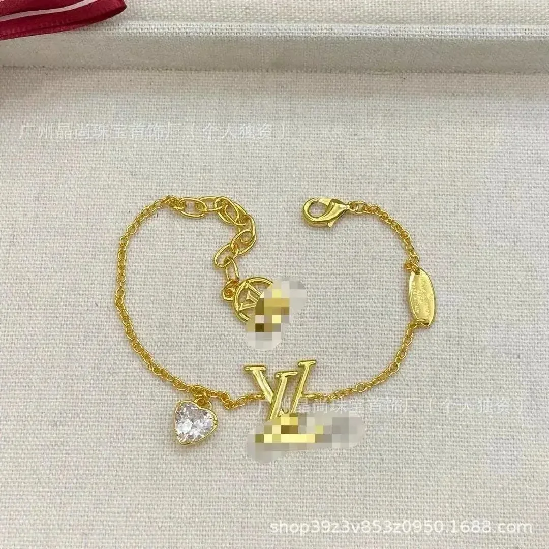 Louis Vuitton Tabi LV Logo Gold Bracelet