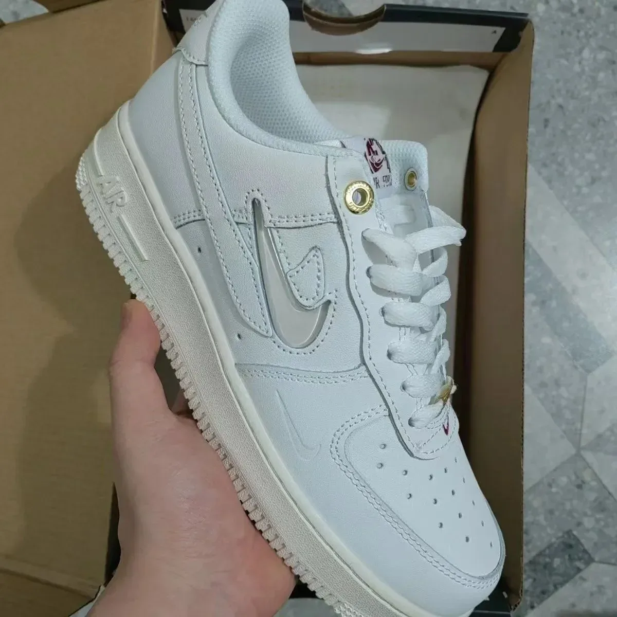 Nike Air Force 1 White Gold Swoosh Sneakers
