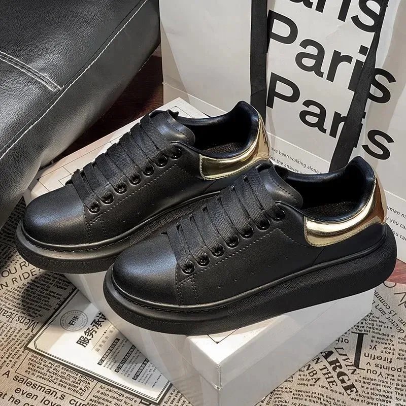 Alexander McQueen McQueen Oversized Black & Gold Sneakers