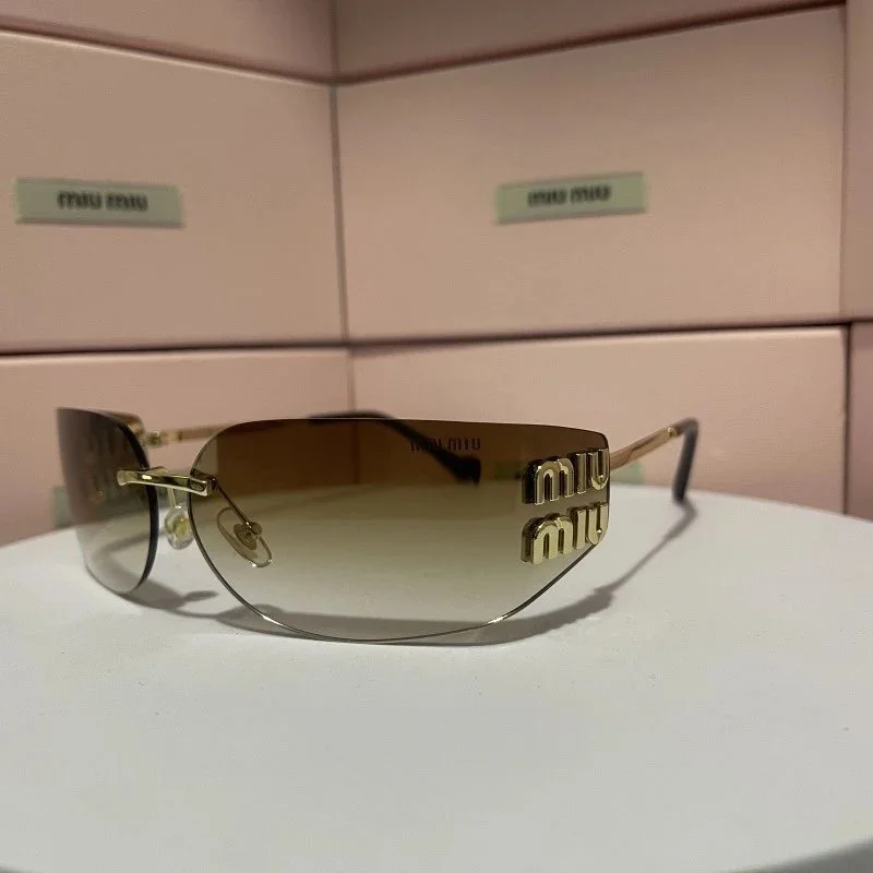Miu Miu Gradient Lens Sunglasses Gold Frame