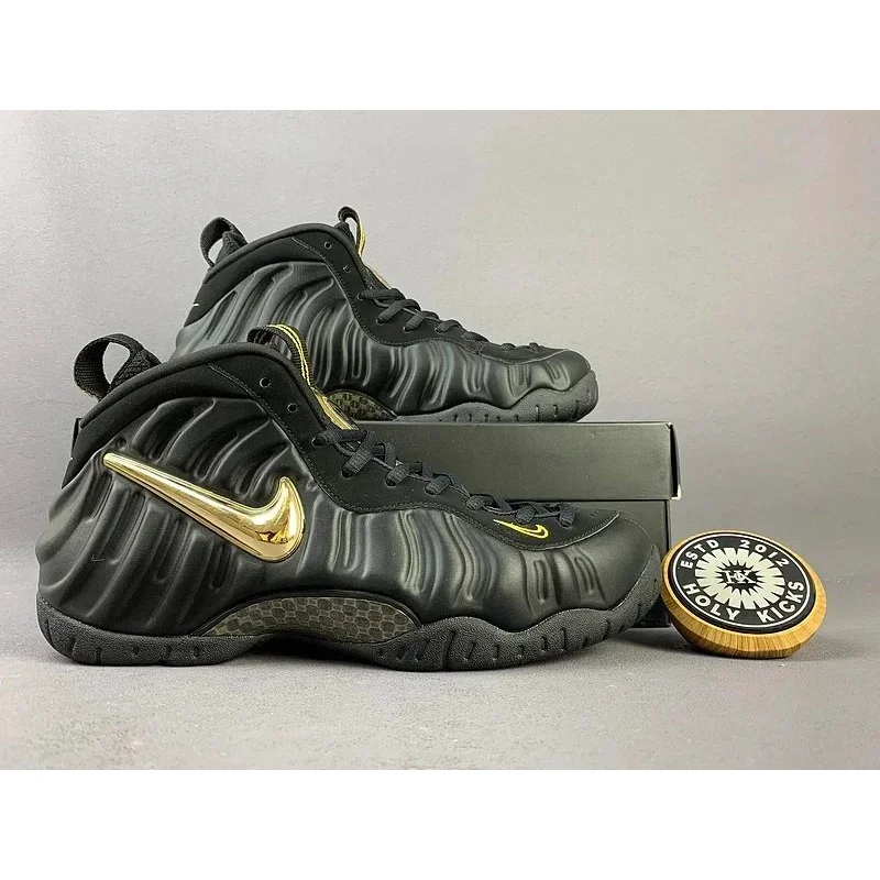 Nike Air Foamposite One Triple Black Gold Swoosh Sneakers