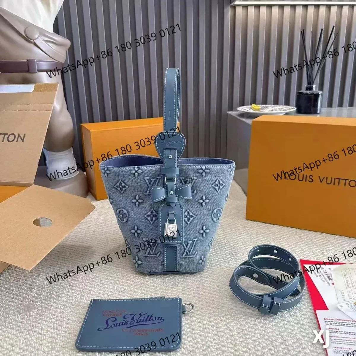 Louis Vuitton Tabi Monogram Denim Bucket Bag Blue